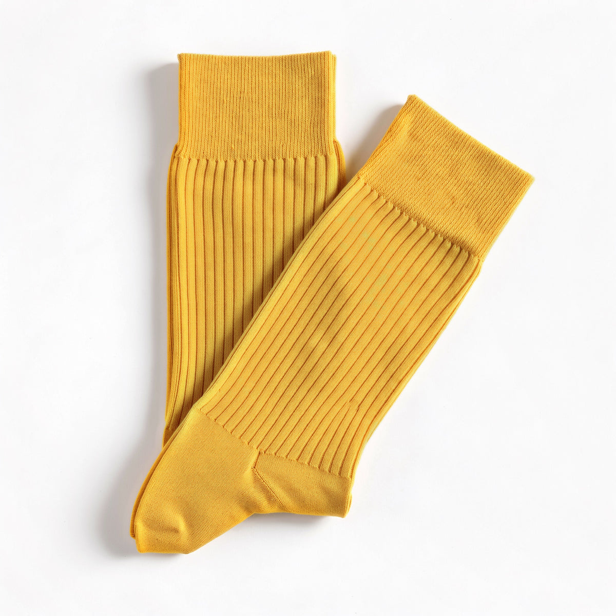Ochre ribbed crew socks, pair laid flat on white